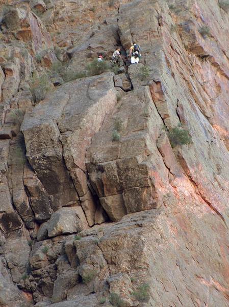 The party ahead of us at the top of the second pitch.  The short crux on this route is just below them.