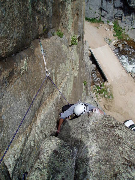 Chuck just about done struggling with the finish to P3. As with P2, the crux is not the overhanging layback, but getting established on the lower angle rock above.  The piece above Chuck is a good green Alien. A good idea to keep the rope from running over the top cams if the second should fall. Shortest approach in Boulder! That's our car below. Just like the old days when you could park at the base of the Bastille.