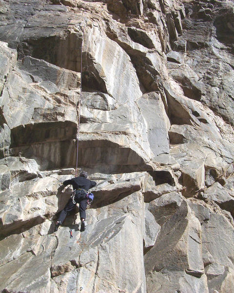 Mark heading up to the first crux roof on Moving Zen, Ra, Empire.