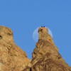 Two unknown climbers on top of Brogan Spire and nearly full moon.  (3-26-21)