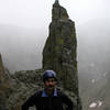 A view back at the Petit Grepon from the Gash descent with Mike Amato in the foreground.