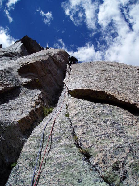 At the top of P4, the 5.8 fist crack shared with East Prow. Mostly face climbing with only a few mandatory crack moves.