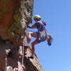 Jean starting the crux layback on the last pitch.