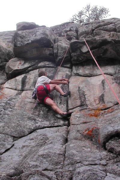 Peter Dillon on the 11d direct start.  The layback is very strenuous and the crack is flared.  The crux is moving out of the layback and getting established below the roof.