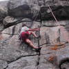 Peter Dillon on the 11d direct start.  The layback is very strenuous and the crack is flared.  The crux is moving out of the layback and getting established below the roof.