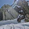 The two rock faces described on summit post. Pass the first on the right and the larger second on the left, where you encounter the crux rock move. Exposed but well protected.