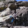 Bart Calkins at the first crux on Arcanum.