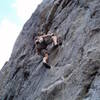 Above the crux on the popular 10a "first pitch".