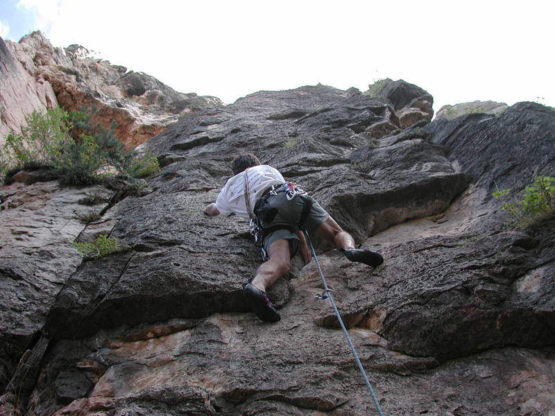 Mike Amato passing the shallow roof at second bolt.