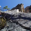 After the last crux. Lenny Miller belaying. Photo by Chuck Graves.