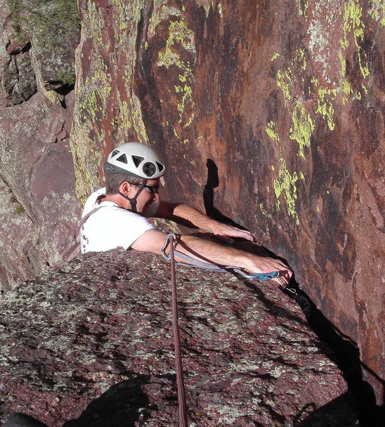 Peter Dillon turning the crux roof on the second pitch.