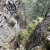 Scramble up the gully near the top. Very loose moss and dirt.