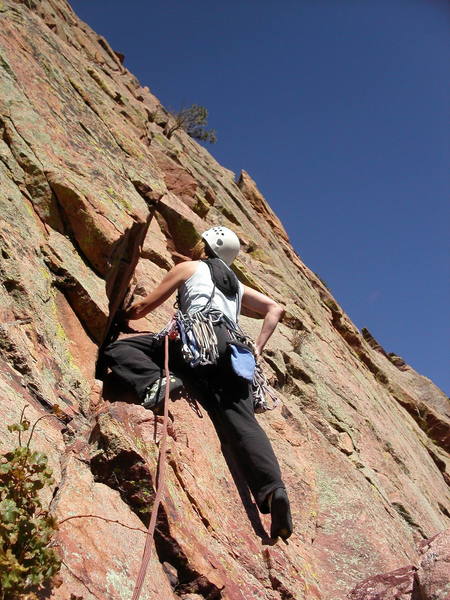 Amy Simper starting up the angling crack on the last pitch.