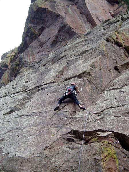 Luke on the crux. It looks easy to step around the arete, but for some reason it's not. The 3 climbers in our party did this move 3 different ways.