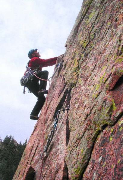 Ron Olsen at the end of the hand traverse on the fourth pitch.