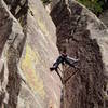 Butt shot with interesting shadows. Luke is mantling the good edge on the left wall. When your foot gets to that edge, you're done with the first crux.