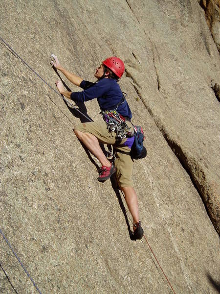 High stepping at the first bolt. There are several positive holds at the start of this crux section. 