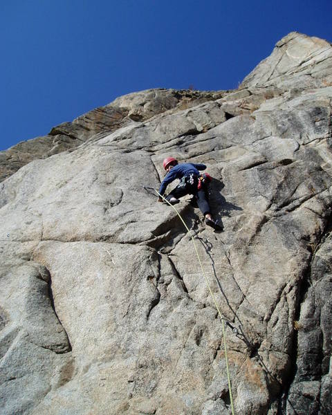 At around the 4th bolt. At several spots you climb a bit right of the bolts. Above Luke you can climb right of the corner and then step left around the arete, or, a little harder, and more in line with the bolts, swing around the arete lower.