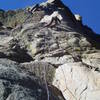 At the first crux. It's tenuous making this clip and then rocking onto the ramp.