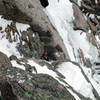 Christa on the third pitch exiting thin ice just above the chockstone.