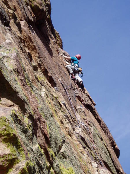 Approaching the perplexing final 5.9+++ move. The crux is pulling over the tiny overhang below Luke.