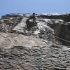 Mike Amato enjoys the huecos on the moderate upper section of the route.