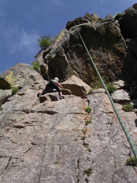 Nickie Kelly at the crux.  Her right foot is smeared, and it's a long reach to insecure handholds.