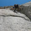 Justin doing battle with the 4th pitch. Another beautiful dihedral with sturdy 5.11 climbing and hard fought gear.