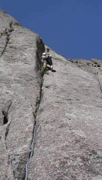 Mike Borkowski jamming the hand crack near the start of the route.