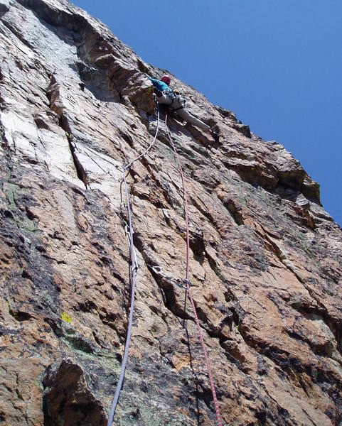 Luke in a big stem at the start of the final hard sequence. Above this about 70' of easier climbing leads to the summit.