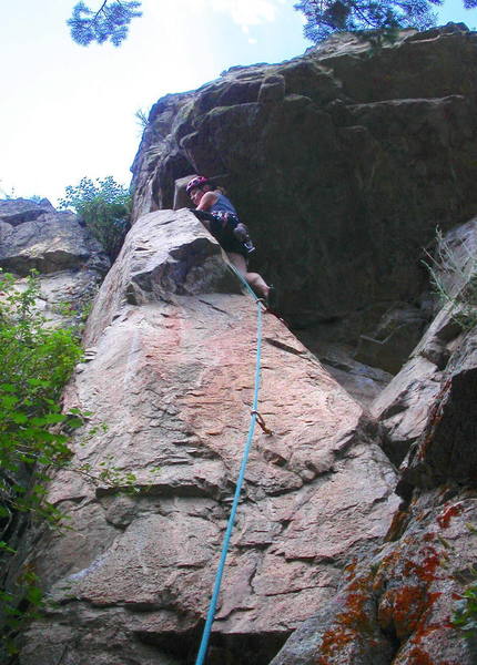 Christa Cline traversing left around the big roof on The Luminosity.