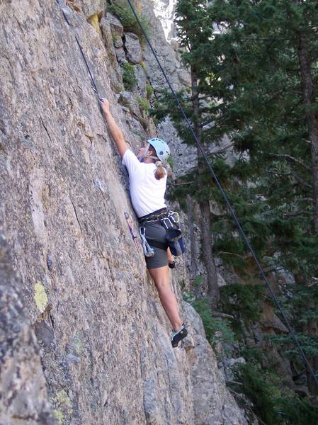 Stetchin' for that good hold on this 5.9-5.10a route.