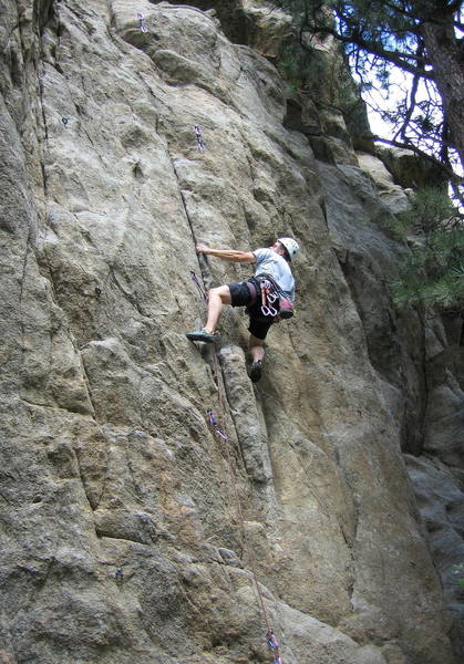 Bruno Hache at the lower crux by the third bolt on Happy Ending.