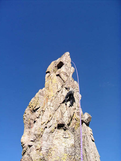 Mark Oveson climbing on the Bishop's Scepter.