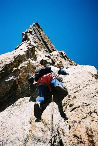 Joe Chorny leaving the Pizza Pan Belay.