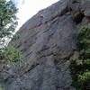 When linked as one pitch this is a long pitch for a sport climb. A 70m rope just touches the ground from the anchors. Although the rope runs very straight, it may still be worthwhile belaying at the P1 anchors to reduce the weight of the rope.