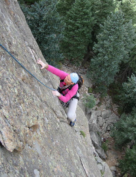 Bruce Hildenbrand on the steep headwall near the top of the pitch.