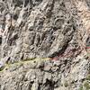 Looking at the last traverse section on the loose dangerous ledge. We roped up on the red section (see topo overlay of this pic), and the rest was 2nd-3rd Class on somewhat exposed ground. This pic ws taken from Casual Buttress.