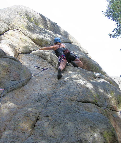 Marga working up the angling crack to the roof.  The climbing is sustained and interesting, with the crux at the top.