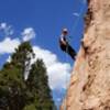 Lisa on rappel (first time cleaning the anchors.