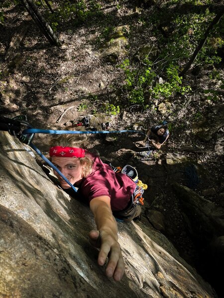 Michael Bihrle at the reachy crux of Golden Days (5.10b)