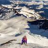 Michael O'Brien moves quickly over easy ice pitches leading to the headwall. 20210604