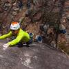 Moving into the slopey crux and preparing to take the whip.