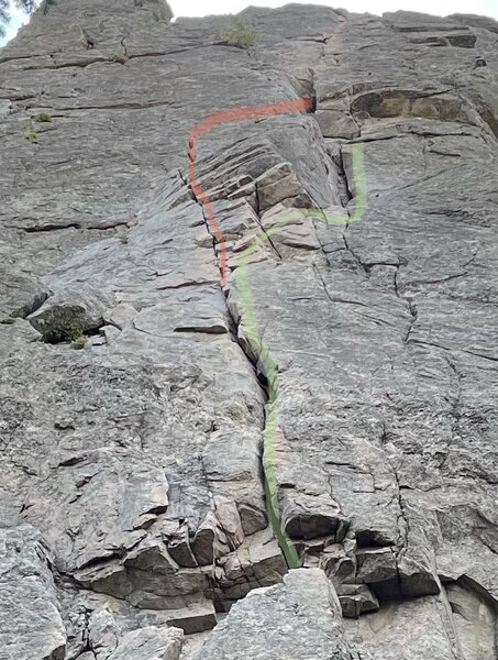 The route proper takes the green line, I believe. If you take the red line, be prepared for a large and somewhat thin step-over onto the P1 belay ledge.