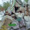 The north wall of the Elephant amphitheater.
<br>

<br>
"The Inside Corner L of Transcendental" is named "Beginner's Route" in Knower's book. The start is obscured by rocks in this pic.