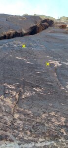 First two bolts on view for the first pitch.  The anchor is on a ledge in the big chasm that opens up in the corner.