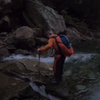 Crossing the creek early in the morning after rainfall in the previous days