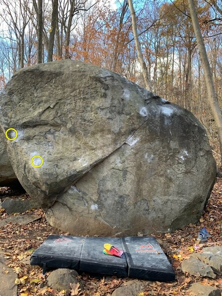 Some of the first holds right of the arete on the boulder.