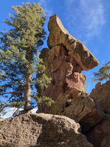 The precariously balanced summit block of Shark's Fin viewed from the NW. It looks more like its name from this location.