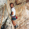 Greg K traversing into the cramped, awkward 2nd belay circa summer 1983